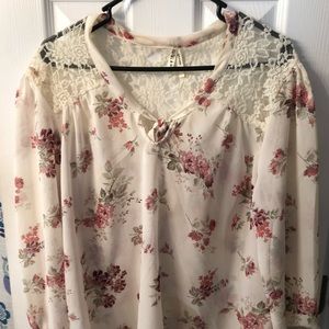 Floral and lace blouse. Ties in back.